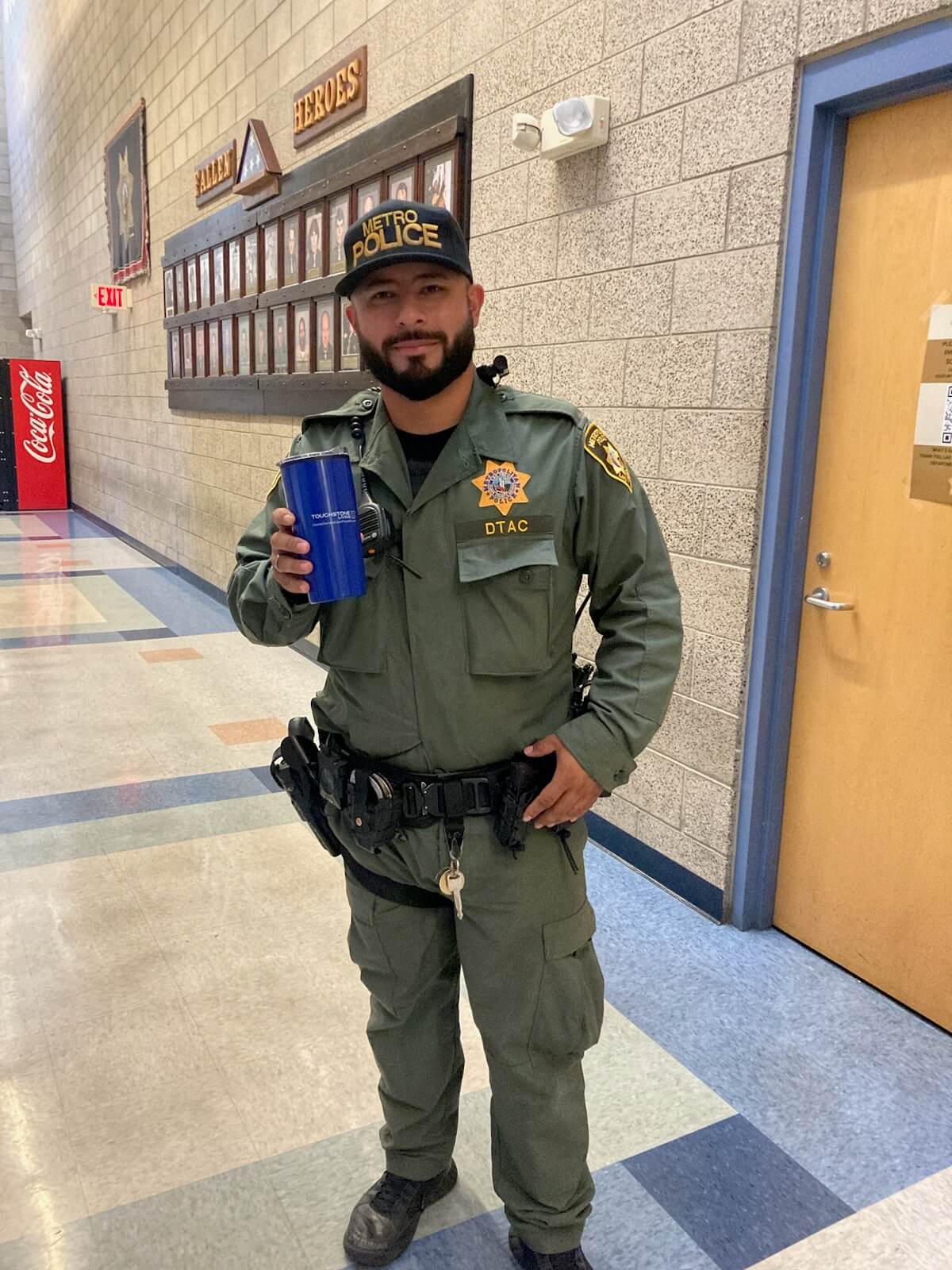 Law enforcement officer with swag from Touchstone Living